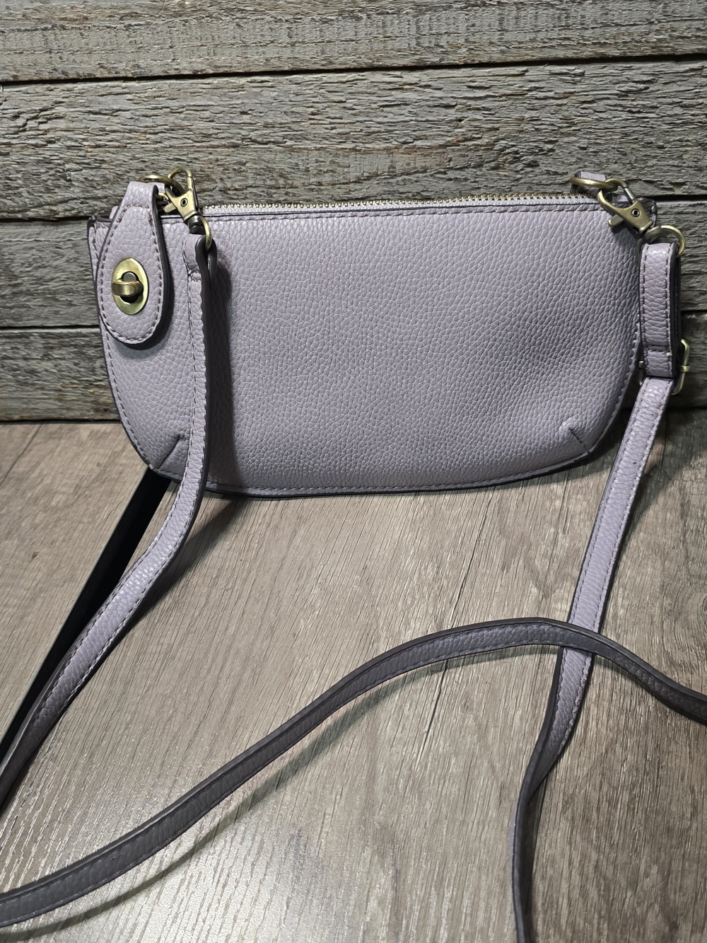 Joy Susan lavender pebbled faux leather mini crossbody bag.